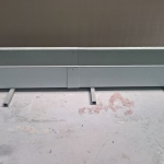 Composite drainage gutter made by manual lamination