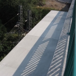 D8, bridge over railway, Trmice - composite covers as an anti-contact protection on the bridge