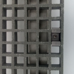 Moulded gratings anchoring