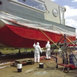 Restoration of the hull - combination of spraying and manual lamination