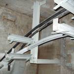 Cable supports with atypical beds